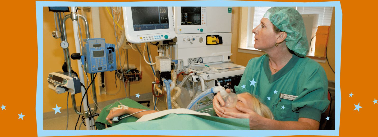 Nurse anesthetist holds anaesthesia mask over Lucas' nose and mouth while looking at a monitor.