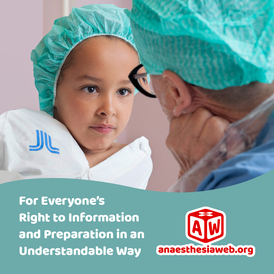 A girl in a green scrub cap looking deep into the eyes of a nurse.