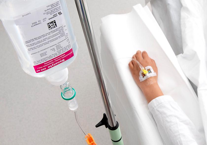Arm with a drip bag.