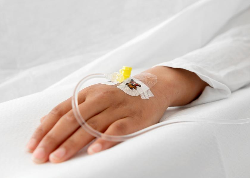 Hand with drip tube.